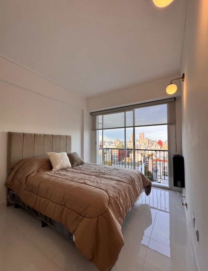 DEPARTAMENTO DE 1 AMB AL LATERAL ABIERTO CON PEQUEÑO BALCON. VENDE Y PERMUTA POR VEHICULO