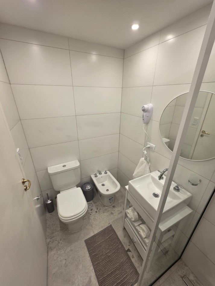 DEPARTAMENTO 2 AMBIENTES AL LATERAL CON PATIO