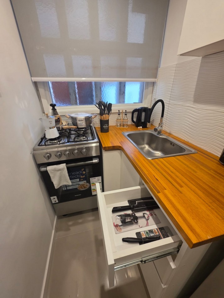 DEPARTAMENTO 2 AMBIENTES AL LATERAL CON PATIO