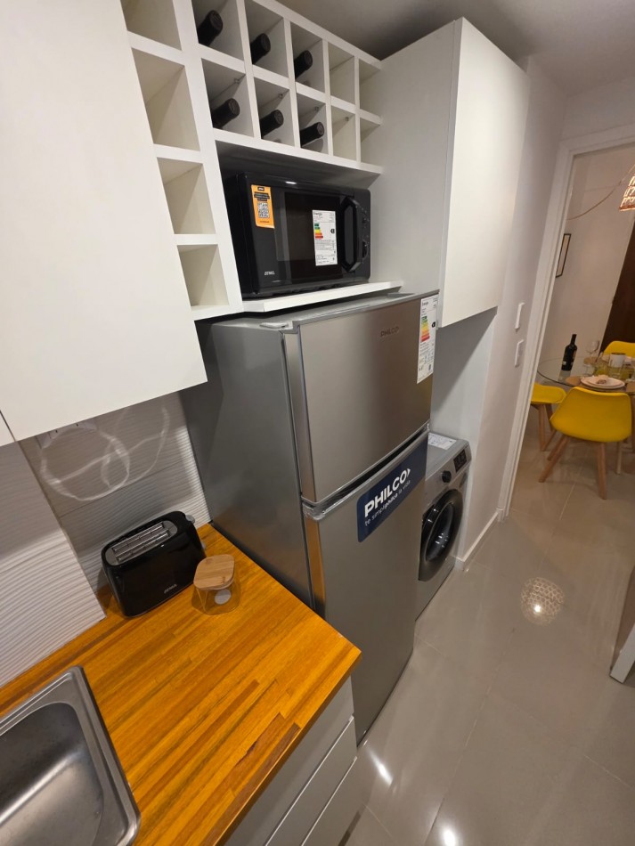 DEPARTAMENTO 2 AMBIENTES AL LATERAL CON PATIO