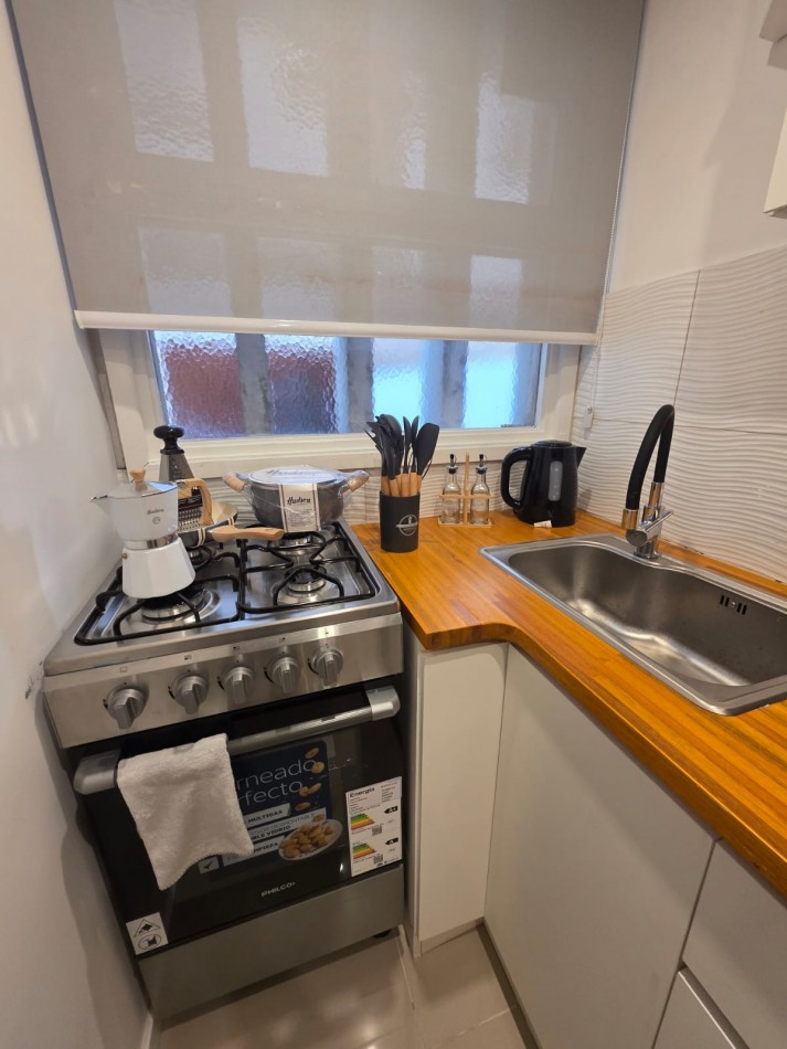 DEPARTAMENTO 2 AMBIENTES AL LATERAL CON PATIO