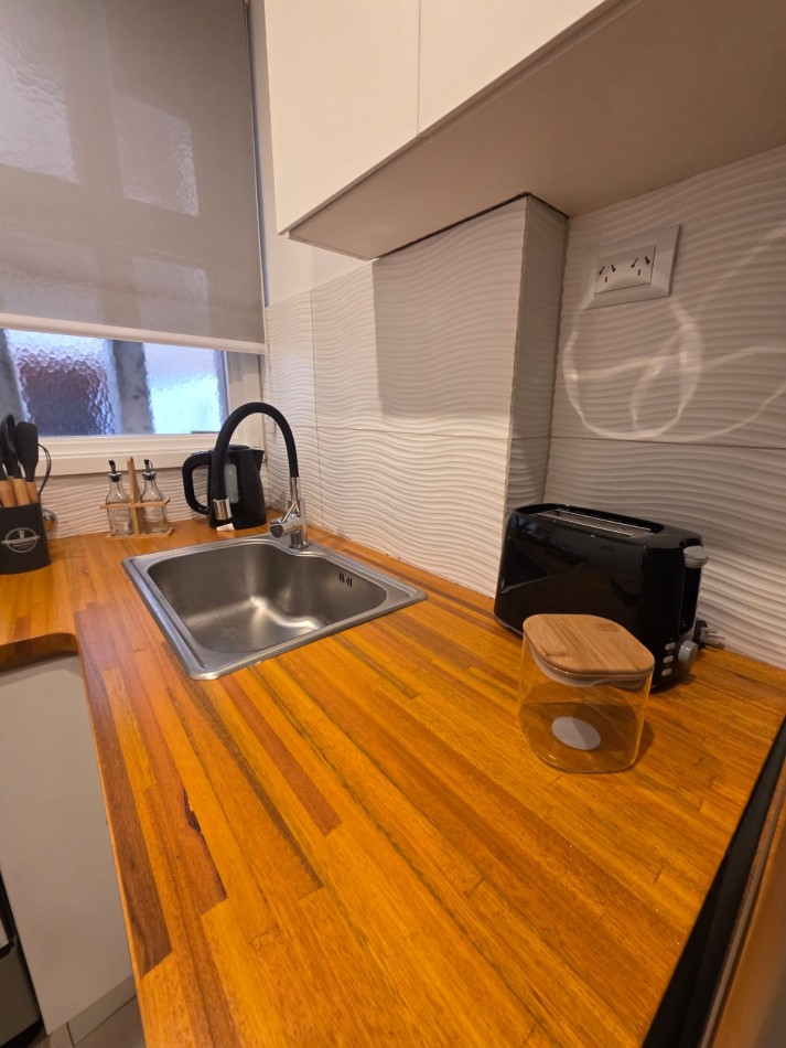 DEPARTAMENTO 2 AMBIENTES AL LATERAL CON PATIO