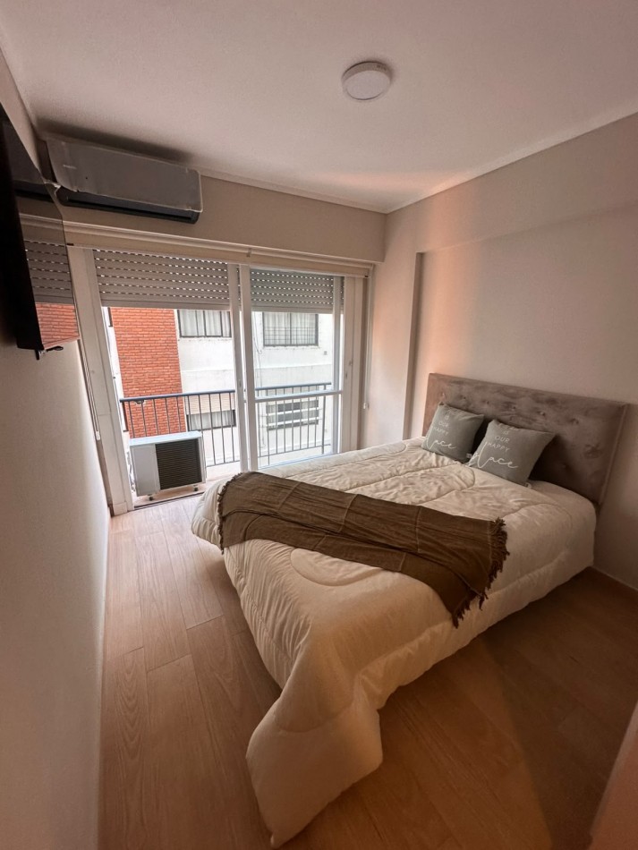 DEPARTAMENTO 1 AMBIENTE Y MEDIO DESPLAZADO CON BALCON SALIENTE AL LATERAL 